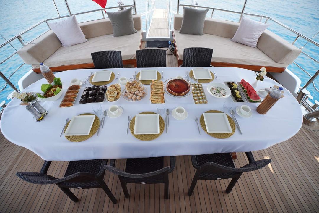 Culinary Delights: Indulge in Alfresco Dining aboard Lavinia